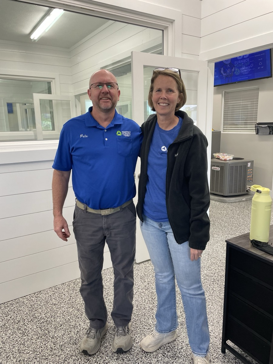 Two Perfect Climate team members in the Vincennes office
